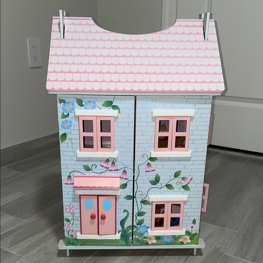 Charming Floral Dollhouse with Pink Roof